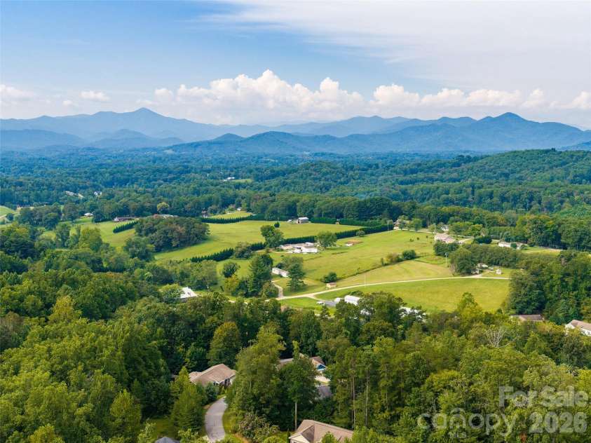 64 Luther Cove Road, Candler, NC 28715.  MLS# CAR4419365, YatesRealty ID 47581. 