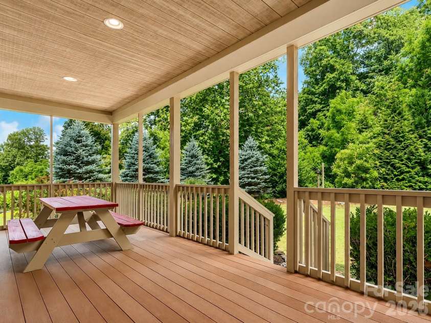 122 Twin Courts Drive, Weaverville, NC 28787.  MLS# CAR4419394, YatesRealty ID 47596. Covered Back Deck