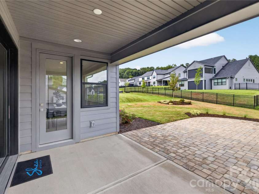 15016 Brownleigh Lane, Huntersville, NC 28078.  MLS# CAR4419395, YatesRealty ID 47597. Covered Patio