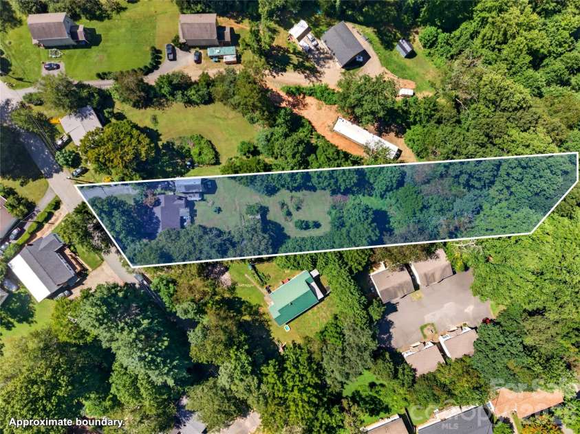 21 Maple Avenue, Candler, NC 28715.  MLS# CAR4415458, YatesRealty ID 47598. 