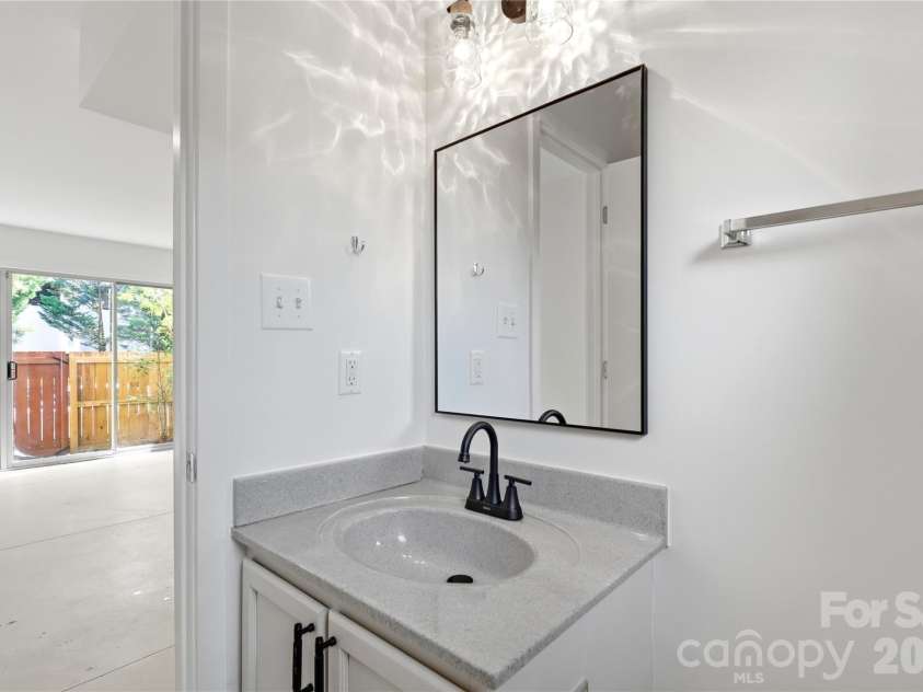 2090 Atherton Heights Lane, Charlotte, NC 28203.  MLS# CAR4419169, YatesRealty ID 47599. Downstairs Bathroom