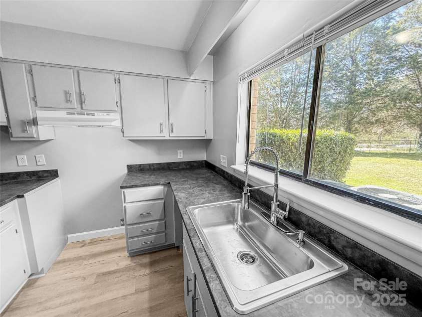 4814 Spring Lake Drive, Charlotte, NC 28212.  MLS# CAR4237398, YatesRealty ID 4760. Appliances installed after photos