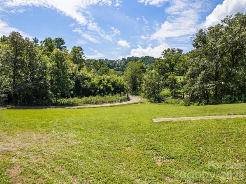 831 Qualla Road, Waynesville, NC 28785.  MLS# CAR4419397, YatesRealty ID 47602. 