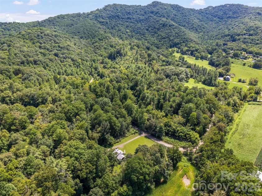 831 Qualla Road, Waynesville, NC 28785.  MLS# CAR4419397, YatesRealty ID 47602. 