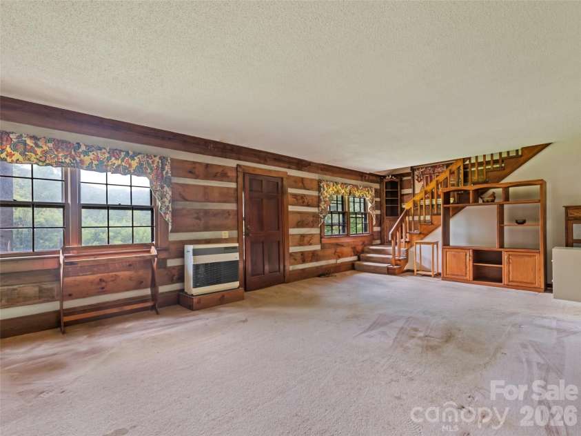 831 Qualla Road, Waynesville, NC 28785.  MLS# CAR4419397, YatesRealty ID 47602. 