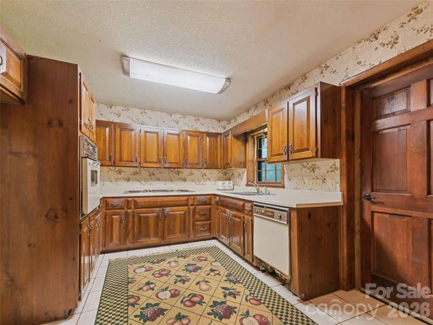 831 Qualla Road, Waynesville, NC 28785.  MLS# CAR4419397, YatesRealty ID 47602. 