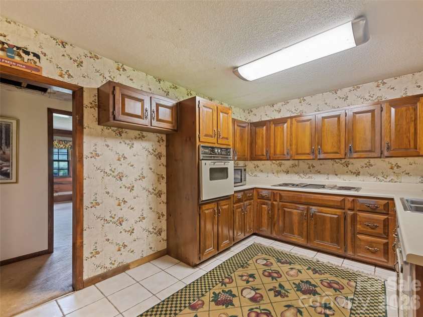 831 Qualla Road, Waynesville, NC 28785.  MLS# CAR4419397, YatesRealty ID 47602. 
