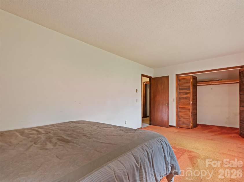 831 Qualla Road, Waynesville, NC 28785.  MLS# CAR4419397, YatesRealty ID 47602. 