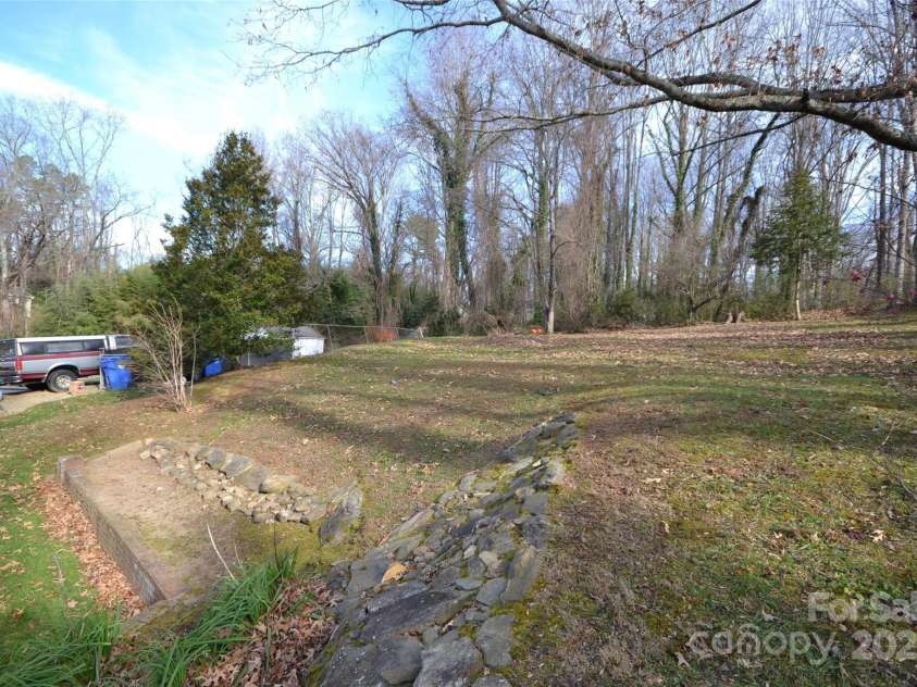 352 London Road, Asheville, NC 28803.  MLS# CAR4325253, YatesRealty ID 4762. Backyard