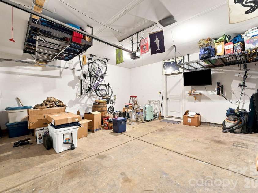 3610 Dolly Madison Road, Charlotte, NC 28208.  MLS# CAR4419185, YatesRealty ID 47622. Garage features overhead storage