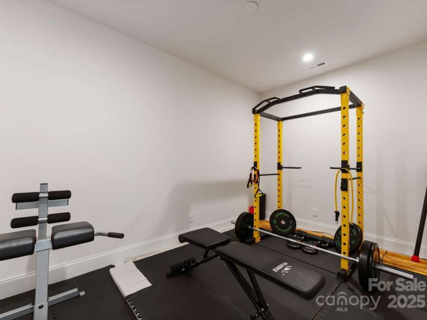 3011 Ella Katherine Way, Charlotte, NC 28210.  MLS# CAR4312353, YatesRealty ID 4763. Basement gym area.
