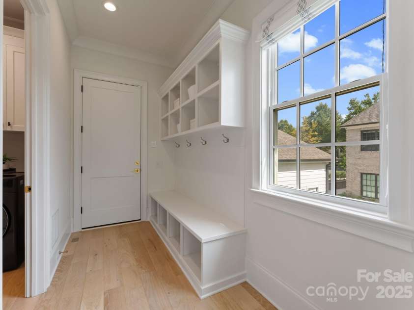 3011 Ella Katherine Way, Charlotte, NC 28210.  MLS# CAR4312353, YatesRealty ID 4763. Drop-zone space off of the garage.