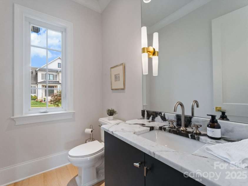 3011 Ella Katherine Way, Charlotte, NC 28210.  MLS# CAR4312353, YatesRealty ID 4763. Main floor powder room.