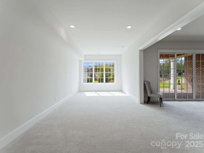 3011 Ella Katherine Way, Charlotte, NC 28210.  MLS# CAR4312353, YatesRealty ID 4763. The open basement area has lots of closet storage space.