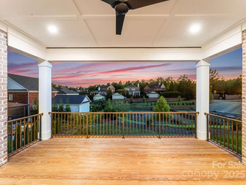 3011 Ella Katherine Way, Charlotte, NC 28210.  MLS# CAR4312353, YatesRealty ID 4763. Twilight view from the main level terrace.