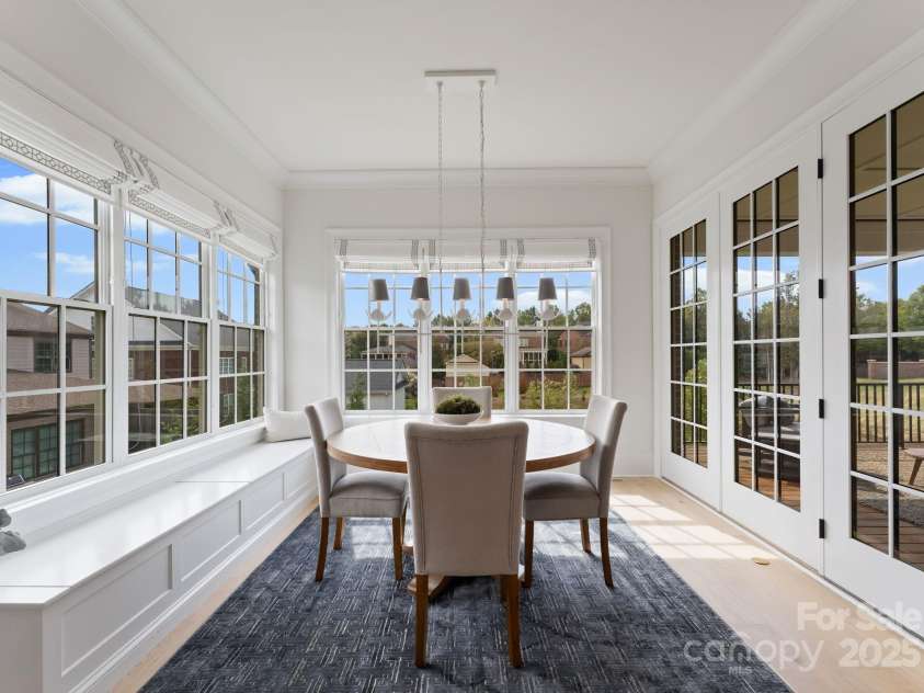 3011 Ella Katherine Way, Charlotte, NC 28210.  MLS# CAR4312353, YatesRealty ID 4763. You can use the window seats in the dining area as a banquette.