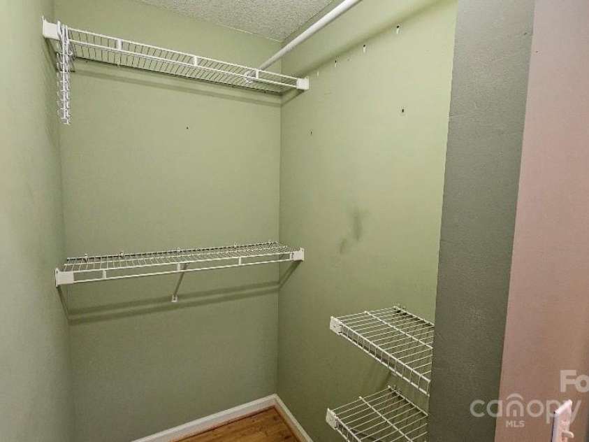 153 Ewbank Garden Drive, Hendersonville, NC 28791.  MLS# CAR4228838, YatesRealty ID 4764. Closet 1 of 2 in primary BR