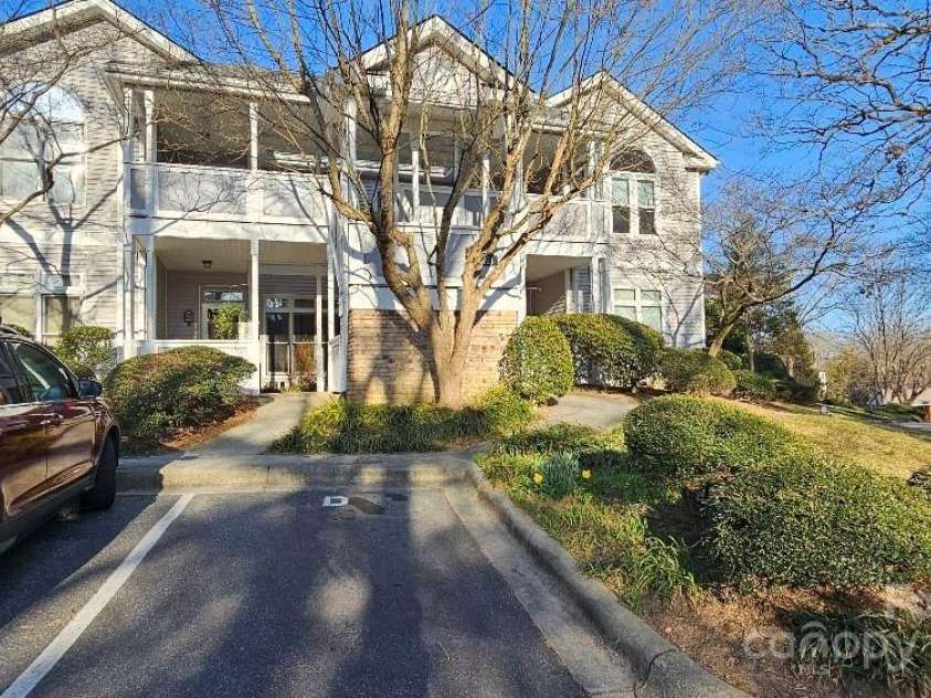 153 Ewbank Garden Drive, Hendersonville, NC 28791.  MLS# CAR4228838, YatesRealty ID 4764. Front of Bldg and assigned parking space