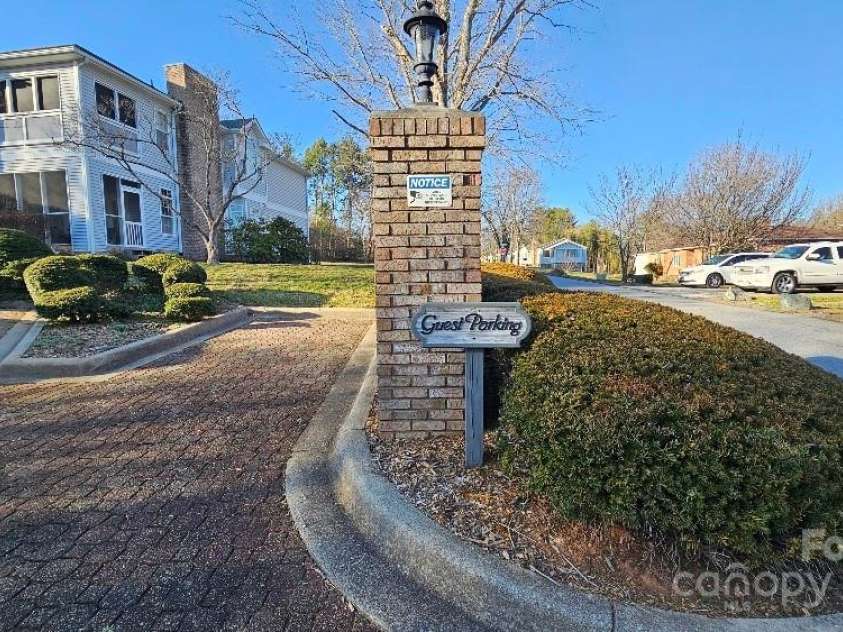153 Ewbank Garden Drive, Hendersonville, NC 28791.  MLS# CAR4228838, YatesRealty ID 4764. Guest parking entrance