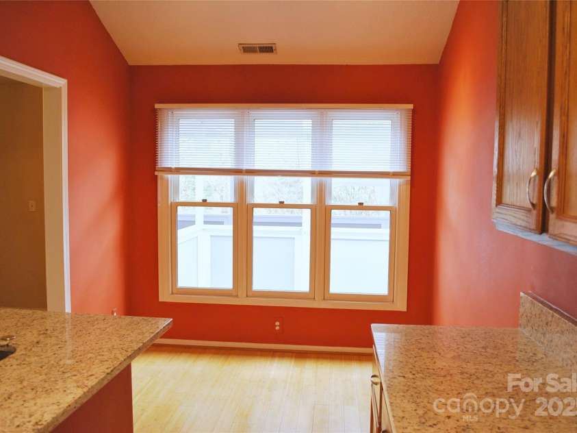 153 Ewbank Garden Drive, Hendersonville, NC 28791.  MLS# CAR4228838, YatesRealty ID 4764. Looking at breakfast area