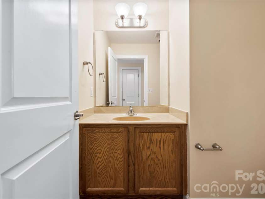 156 B Wash Creek Drive, Hendersonville, NC 28739.  MLS# CAR4417230, YatesRealty ID 47640. Main Level Half Bath