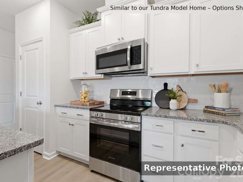 6609 Fire Lily Lane, Charlotte, NC 28216.  MLS# CAR4419428, YatesRealty ID 47646. 