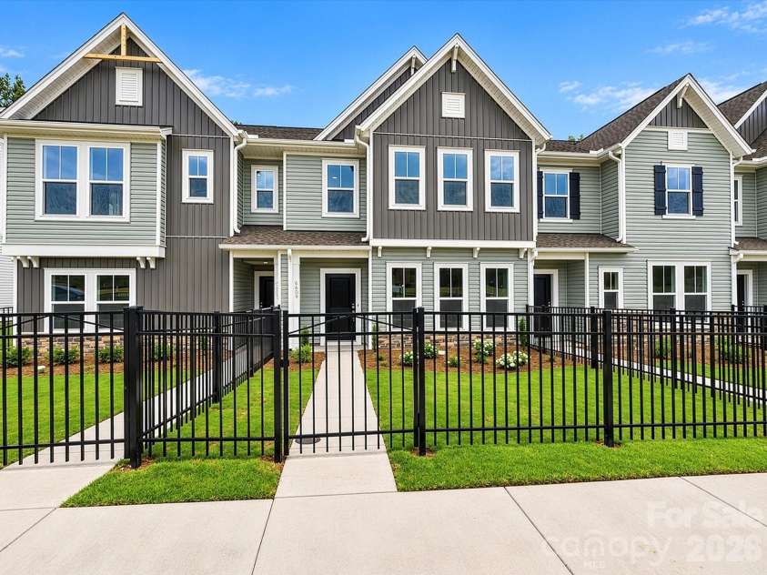 6609 Fire Lily Lane, Charlotte, NC 28216.  MLS# CAR4419428, YatesRealty ID 47646. Front Yard Fenced in for Privacy and Security