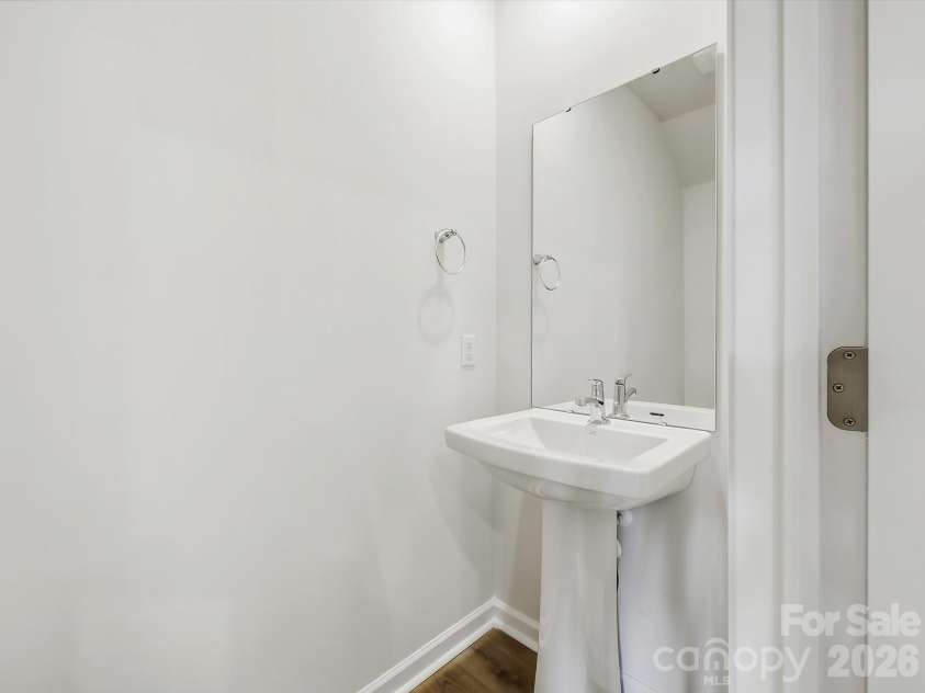 6609 Fire Lily Lane, Charlotte, NC 28216.  MLS# CAR4419428, YatesRealty ID 47646. Powder Room on 1st Floor