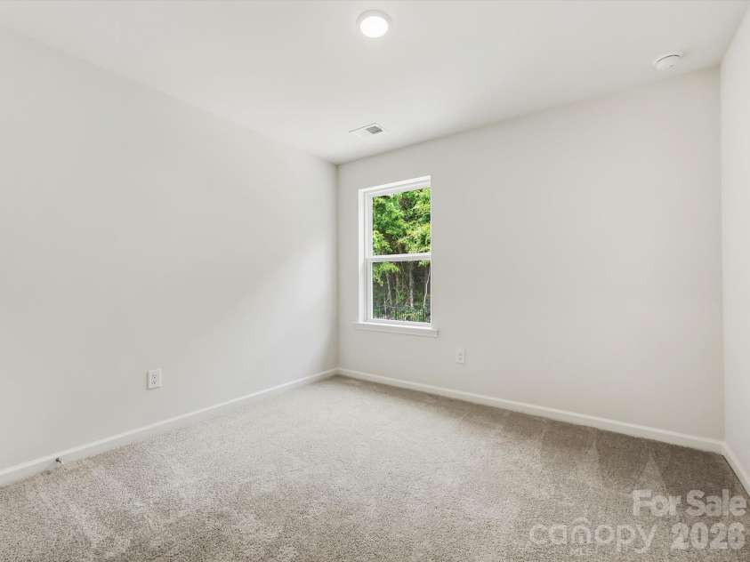 6609 Fire Lily Lane, Charlotte, NC 28216.  MLS# CAR4419428, YatesRealty ID 47646. Secondary Bedroom on 2nd Floor