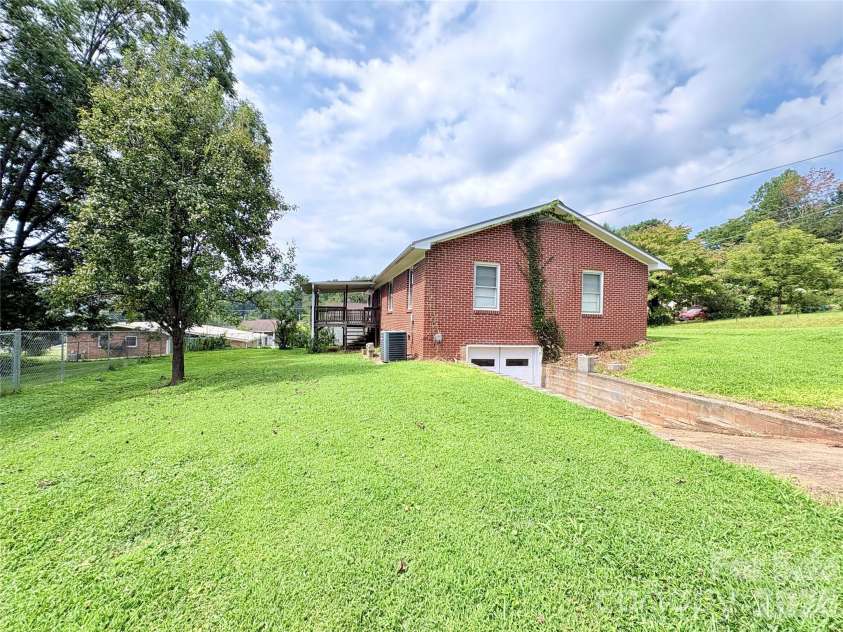 30 Cypress Road, Marion, NC 28752.  MLS# CAR4415615, YatesRealty ID 47647. Back/Side yard