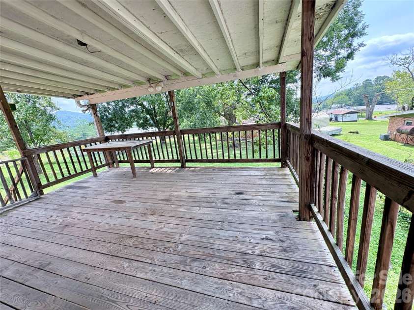 30 Cypress Road, Marion, NC 28752.  MLS# CAR4415615, YatesRealty ID 47647. Covered back porch