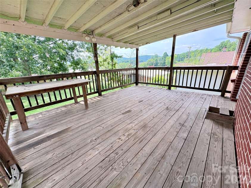 30 Cypress Road, Marion, NC 28752.  MLS# CAR4415615, YatesRealty ID 47647. Covered back porch