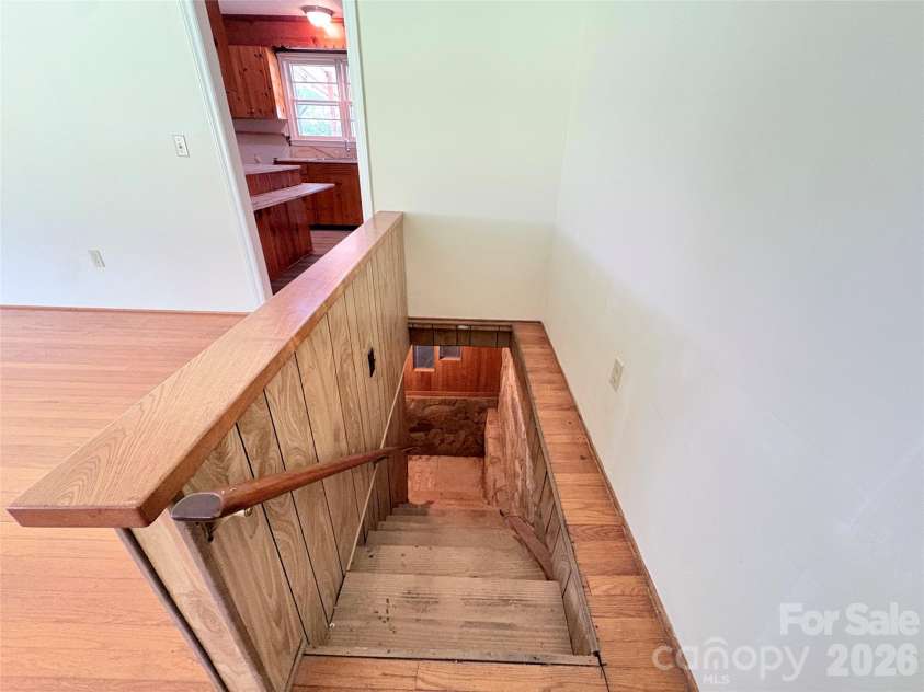 30 Cypress Road, Marion, NC 28752.  MLS# CAR4415615, YatesRealty ID 47647. Stairs to basement