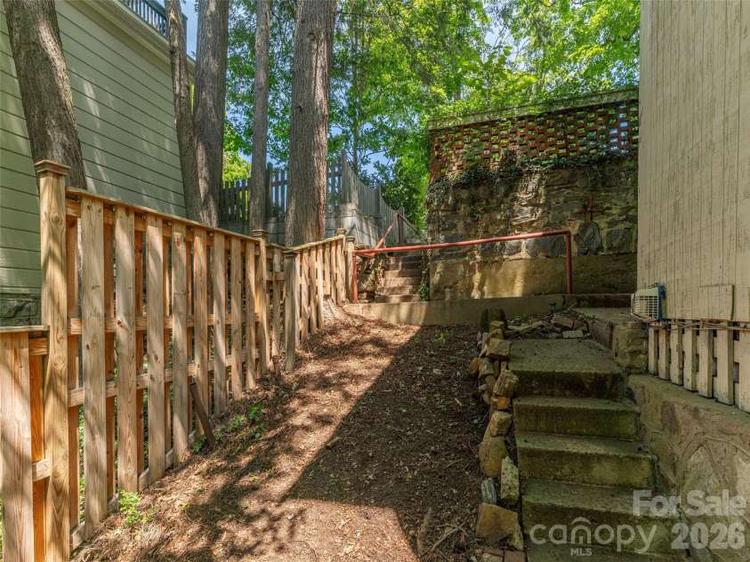 130 Edwin Place, Asheville, NC 28801.  MLS# CAR4418840, YatesRealty ID 47655. Back Stairway