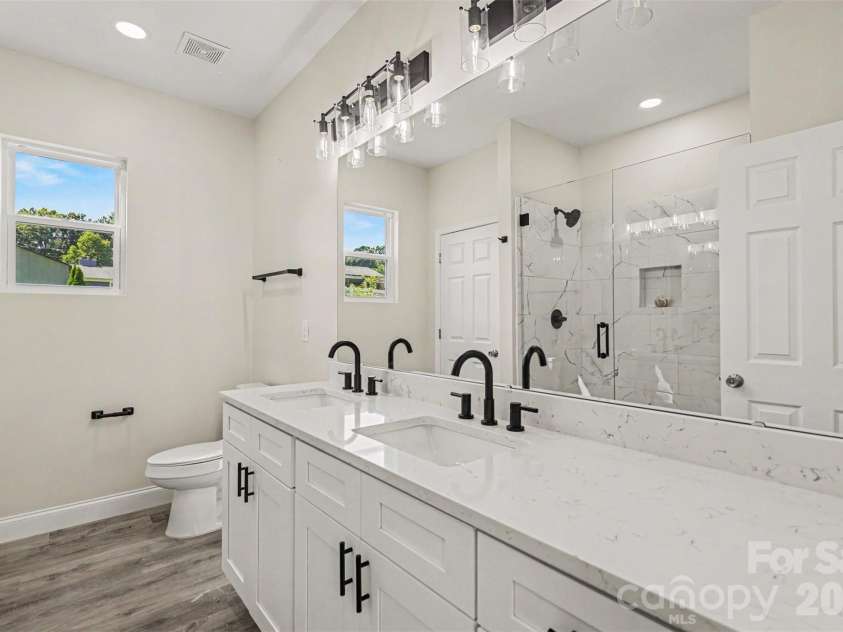 2005 Overhill Drive, Monroe, NC 28110.  MLS# CAR4416161, YatesRealty ID 47661. Primary Bathroom