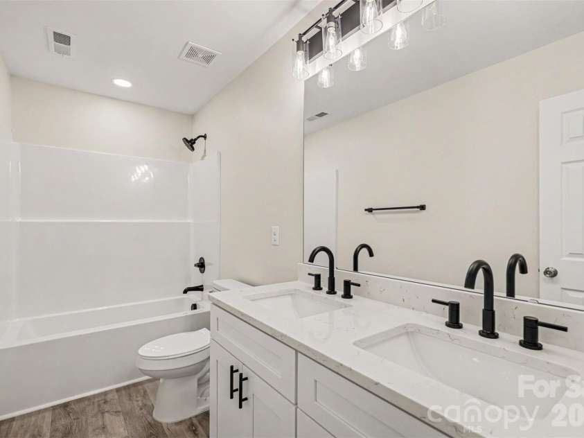 2005 Overhill Drive, Monroe, NC 28110.  MLS# CAR4416161, YatesRealty ID 47661. Upstairs Bathroom