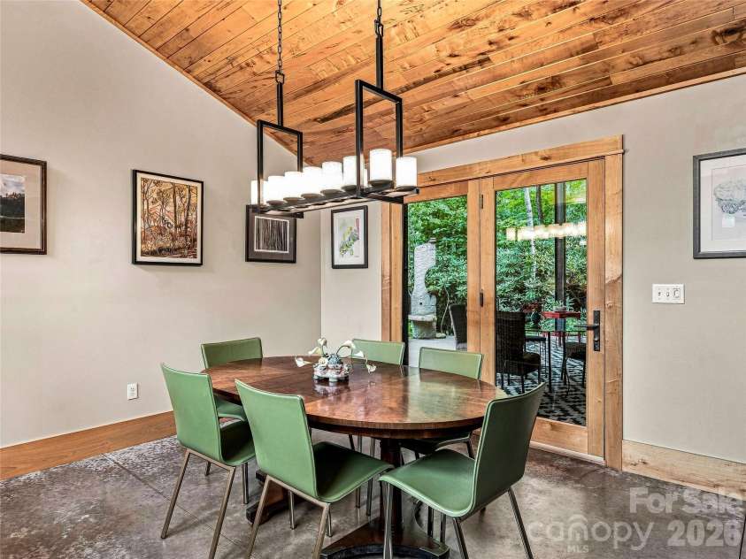 33 Robinson Creek Road, Asheville, NC 28803.  MLS# CAR4415737, YatesRealty ID 47672. Ample dining space adjacent to the kitchen.