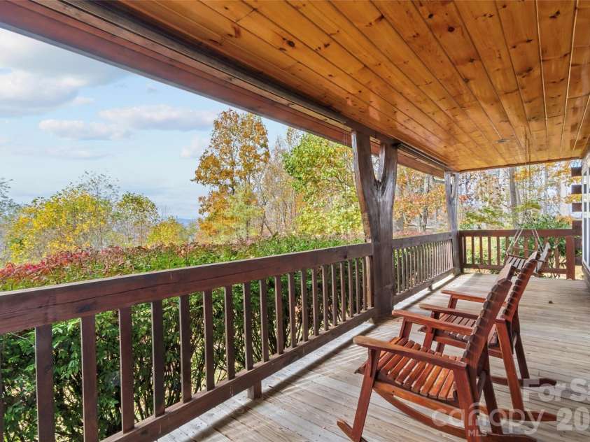 1447/1421 Ayers Mountain Road, Green Mountain, NC 28740.  MLS# CAR4315855, YatesRealty ID 4768. Covered front porch main home