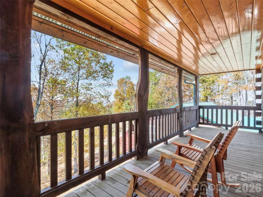 1447/1421 Ayers Mountain Road, Green Mountain, NC 28740.  MLS# CAR4315855, YatesRealty ID 4768. Covered porch workshop/studio