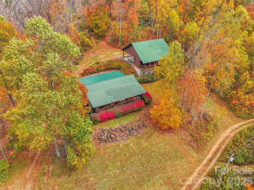 1447/1421 Ayers Mountain Road, Green Mountain, NC 28740.  MLS# CAR4315855, YatesRealty ID 4768. Main house w/separate workshop/studio