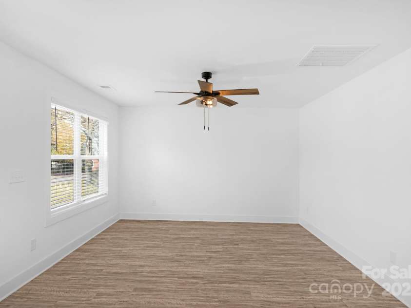 324 Ashford Street, Chester, SC 29706.  MLS# CAR4319489, YatesRealty ID 4768. Sunny secondary bedroom — perfect for guests, office, or nursery.