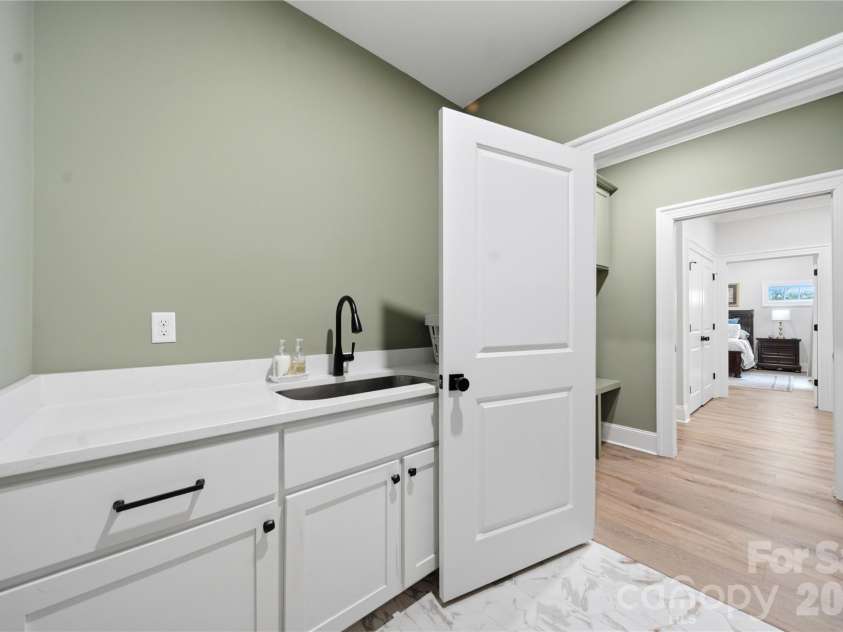 531 Buckview Lane, Elgin, SC 29045.  MLS# CAR4418868, YatesRealty ID 47683. Large Laundry with Deep Sink
