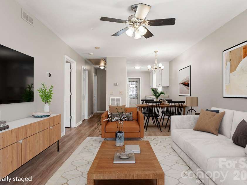 206 Oakland Avenue, Greer, SC 29650.  MLS# CAR4418978, YatesRealty ID 47684. Living room virtually staged