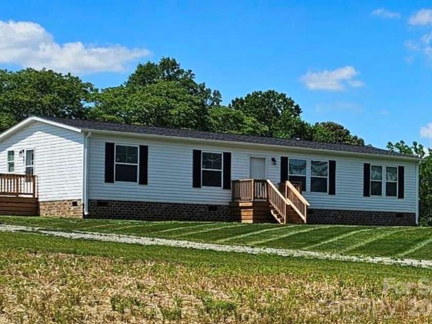 501 Eagle Mills Road, Hamptonville, NC 27020.  MLS# CAR4311085, YatesRealty ID 4769. 