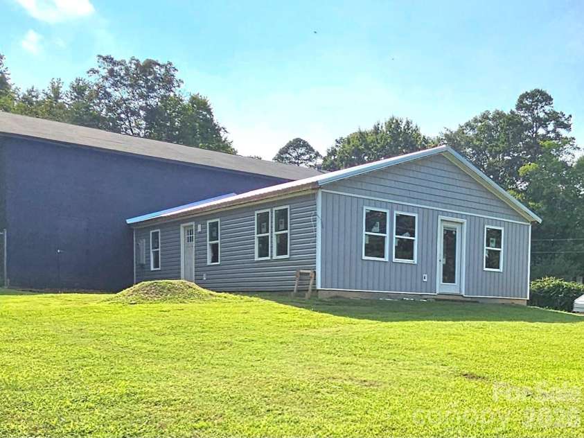 225 Eighth Avenue, New London, NC 28127.  MLS# CAR4413315, YatesRealty ID 47690. 