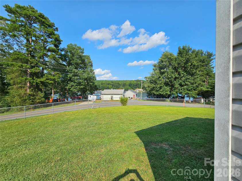225 Eighth Avenue, New London, NC 28127.  MLS# CAR4413315, YatesRealty ID 47690. 