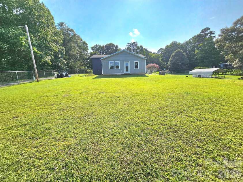 225 Eighth Avenue, New London, NC 28127.  MLS# CAR4413315, YatesRealty ID 47690. 