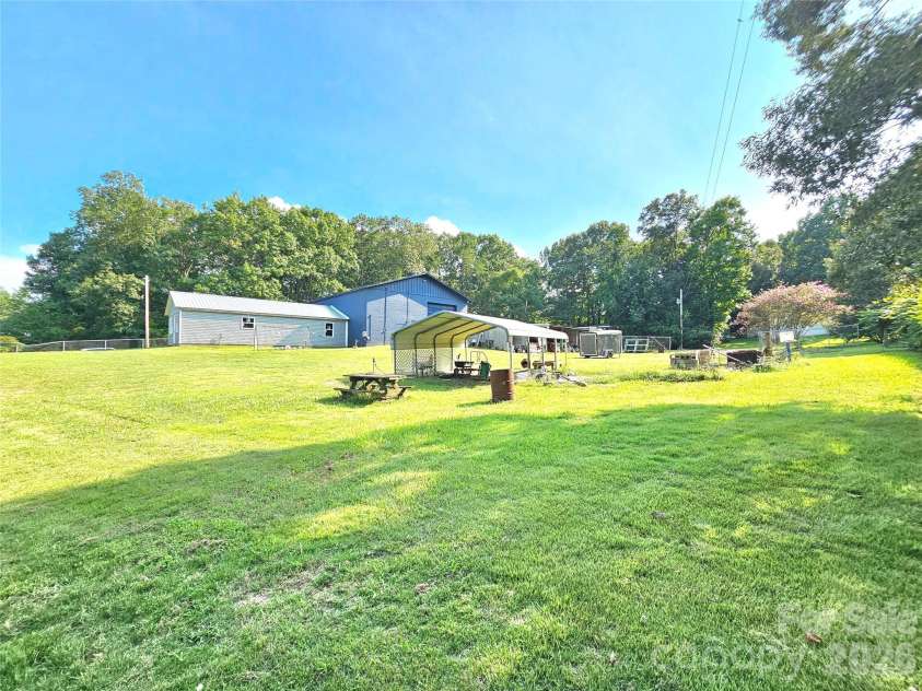 225 Eighth Avenue, New London, NC 28127.  MLS# CAR4413315, YatesRealty ID 47690. 