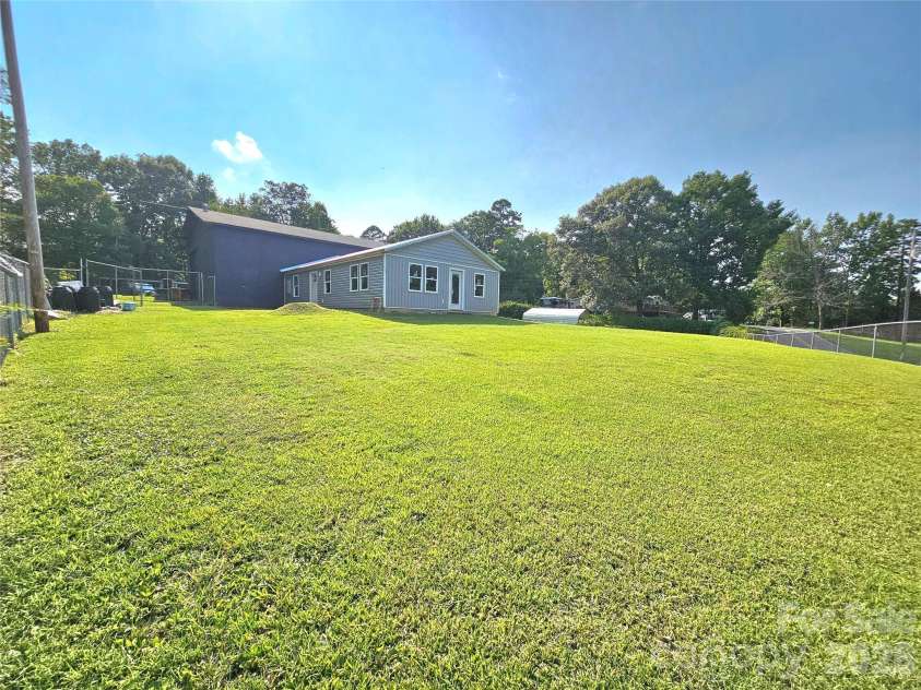 225 Eighth Avenue, New London, NC 28127.  MLS# CAR4413315, YatesRealty ID 47690. 
