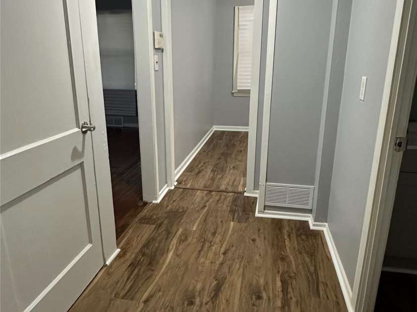 1012 Louise Road, Winston Salem, NC 27107.  MLS# CAR4419508, YatesRealty ID 47691. Looking toward kitchen from bedrooms